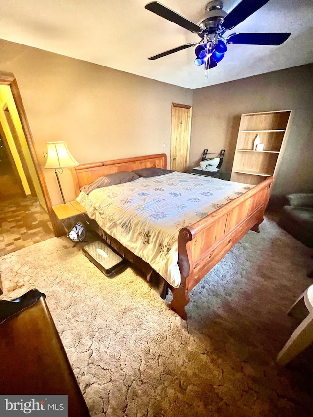 bedroom with carpet flooring and ceiling fan