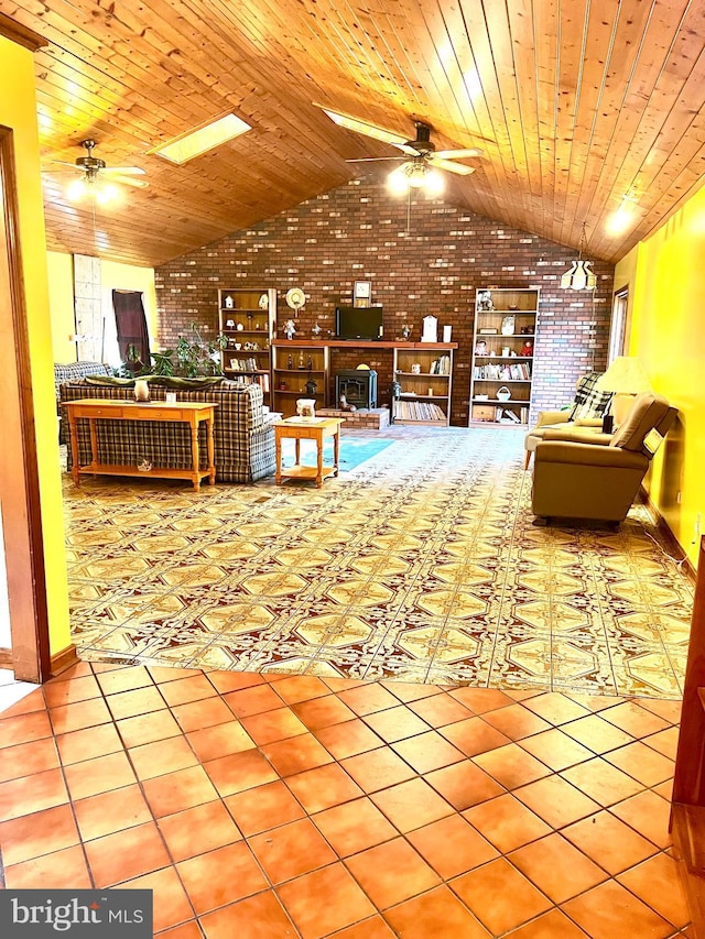 interior space featuring tile patterned flooring, wooden ceiling, and brick wall