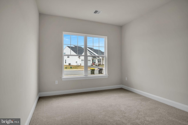 spare room with carpet flooring