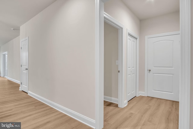 hallway featuring light hardwood / wood-style floors