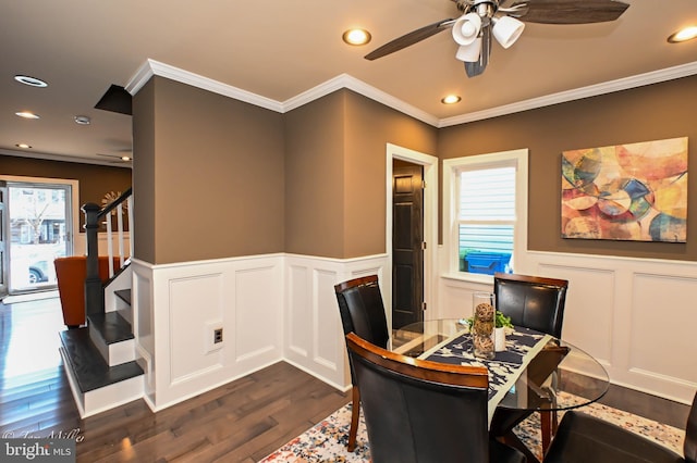 office featuring dark hardwood / wood-style flooring, ceiling fan, and crown molding