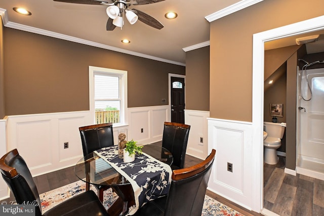 dining area featuring ceiling fan, dark hardwood / wood-style flooring, and ornamental molding