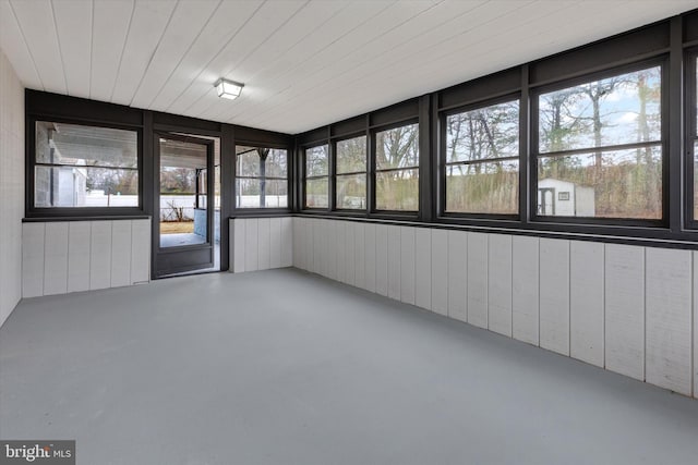 unfurnished sunroom with a wealth of natural light