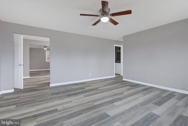 unfurnished room with light hardwood / wood-style floors and ceiling fan