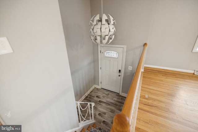 entryway with wood-type flooring