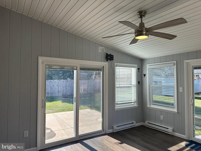 unfurnished sunroom with a wealth of natural light, baseboard heating, and ceiling fan