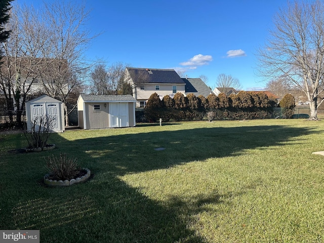 view of yard featuring a storage unit