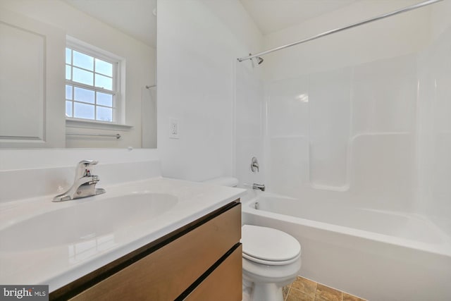 full bathroom featuring vanity,  shower combination, and toilet