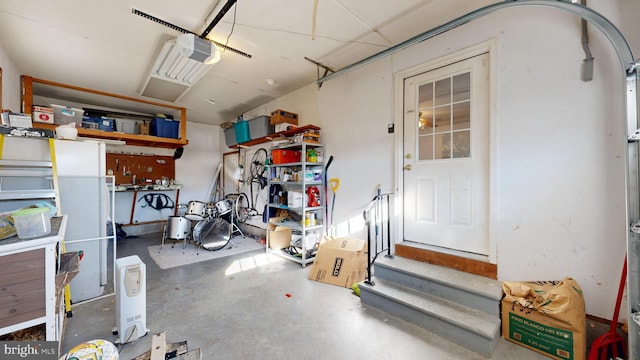 garage featuring a garage door opener