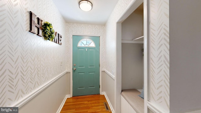 entryway with light hardwood / wood-style flooring