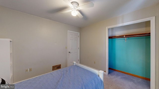 unfurnished bedroom with a closet, ceiling fan, and light colored carpet