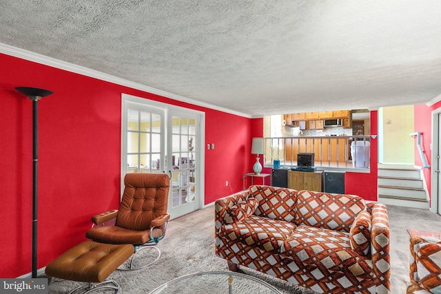 carpeted living room featuring crown molding, french doors, and a textured ceiling