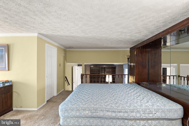 bedroom with crown molding, light colored carpet, and a textured ceiling