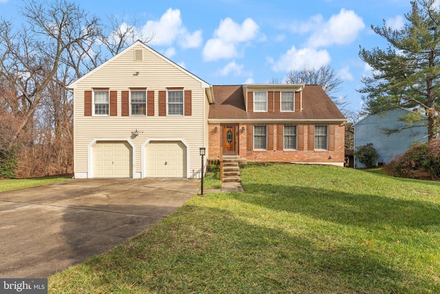 view of front of home featuring a garage and a front yard