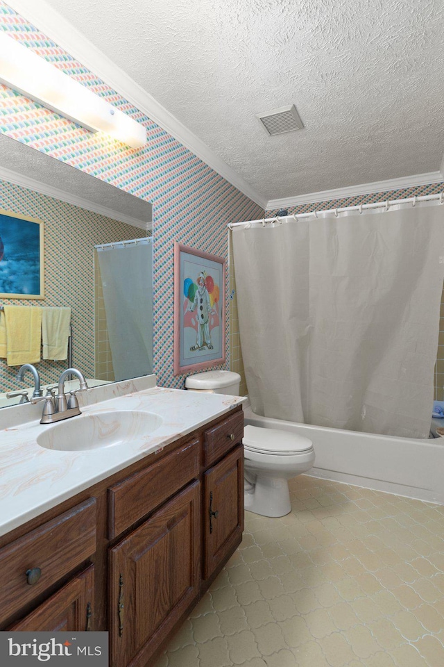 full bathroom featuring a textured ceiling and crown molding