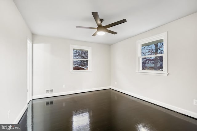 unfurnished room featuring ceiling fan