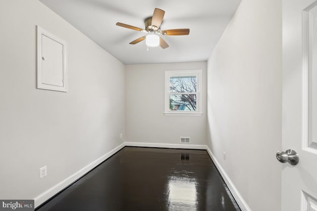 empty room featuring ceiling fan