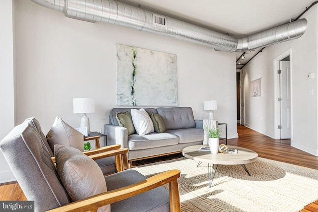 living room with hardwood / wood-style floors