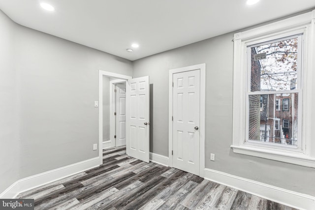 empty room featuring dark hardwood / wood-style floors