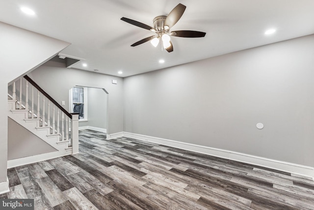 interior space featuring ceiling fan and dark hardwood / wood-style floors