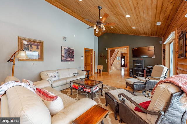 living room featuring ceiling fan, high vaulted ceiling, wood ceiling, and light hardwood / wood-style floors