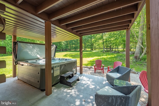 view of patio with a hot tub