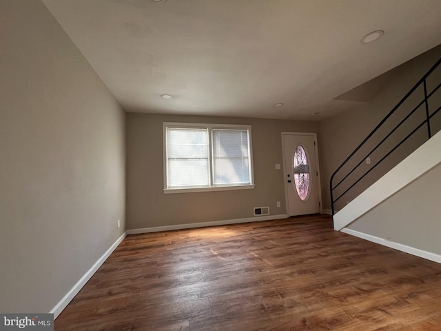 foyer entrance featuring dark hardwood / wood-style flooring