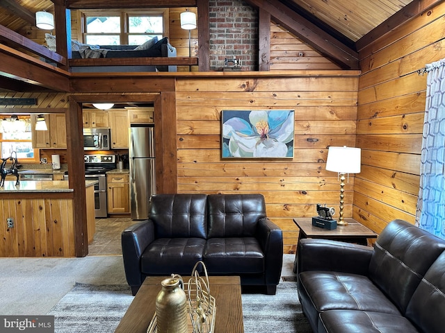 living room featuring wooden walls, light colored carpet, and a wealth of natural light