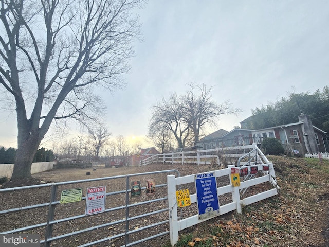 view of yard at dusk