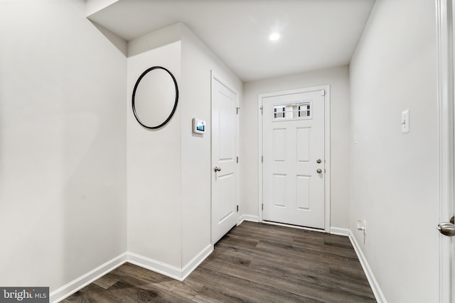 doorway to outside with dark hardwood / wood-style flooring