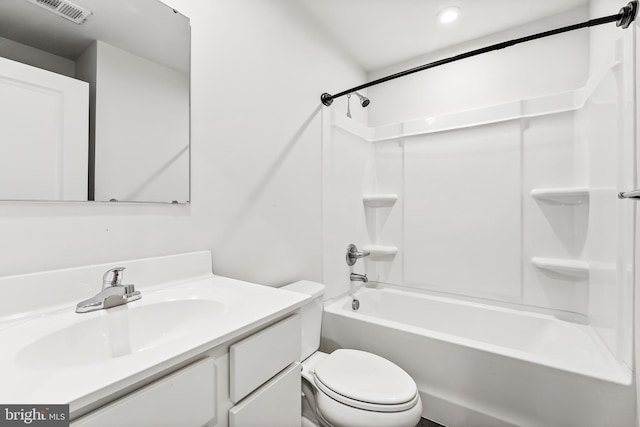 full bathroom with vanity,  shower combination, and toilet