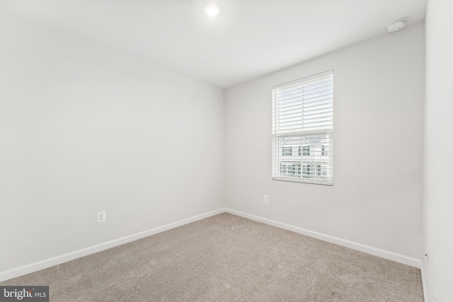 empty room with carpet floors