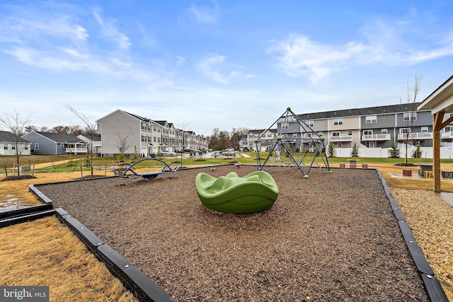 view of home's community featuring a playground