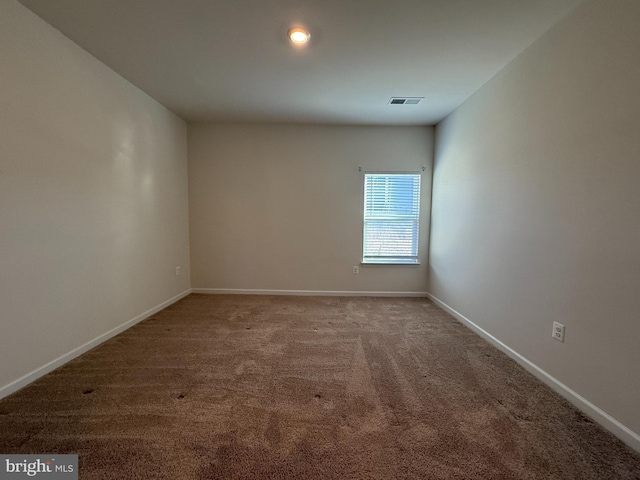 view of carpeted spare room