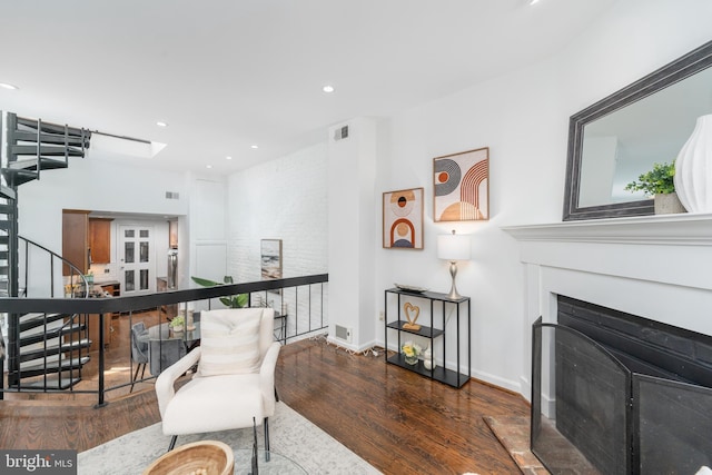 living area featuring dark wood-type flooring