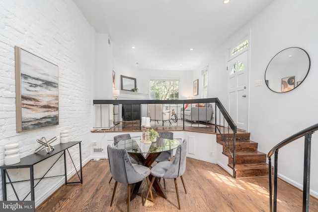 dining space featuring hardwood / wood-style flooring