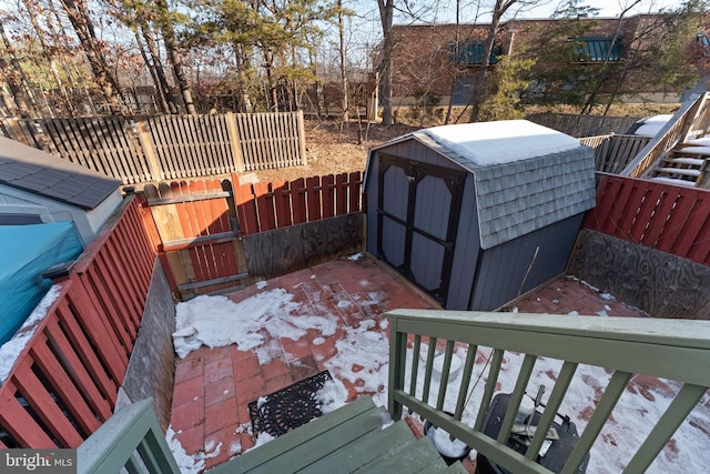 deck with a storage shed