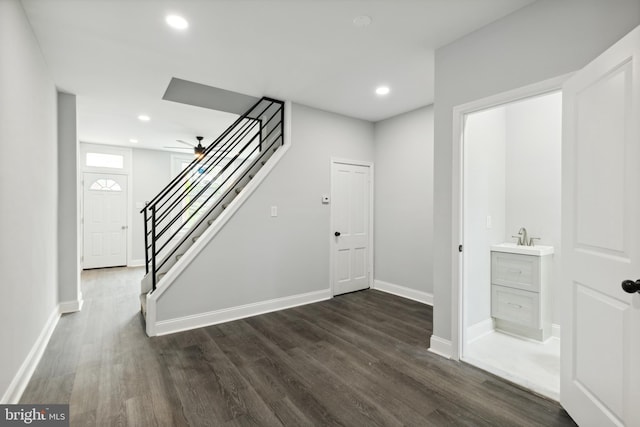 interior space with hardwood / wood-style flooring and ceiling fan