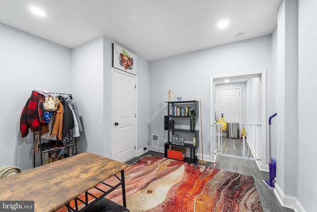 office area with dark wood-type flooring