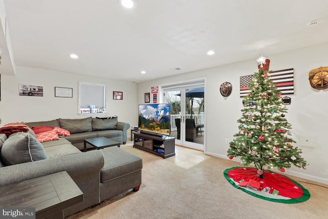 living room with light carpet and french doors