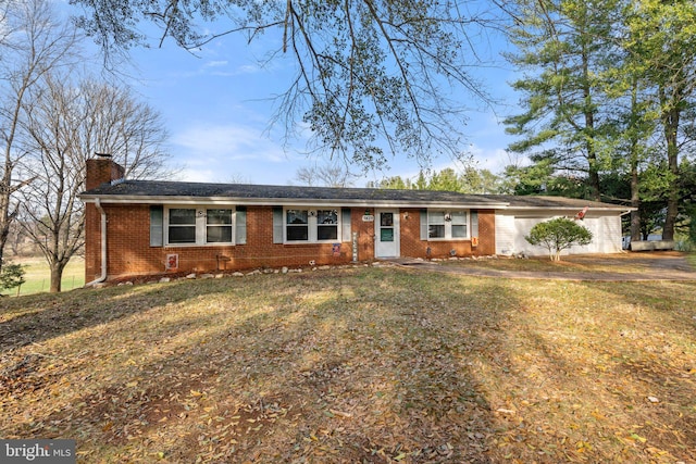 ranch-style home with a front yard