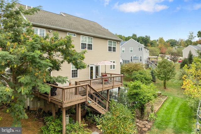 back of property featuring a deck