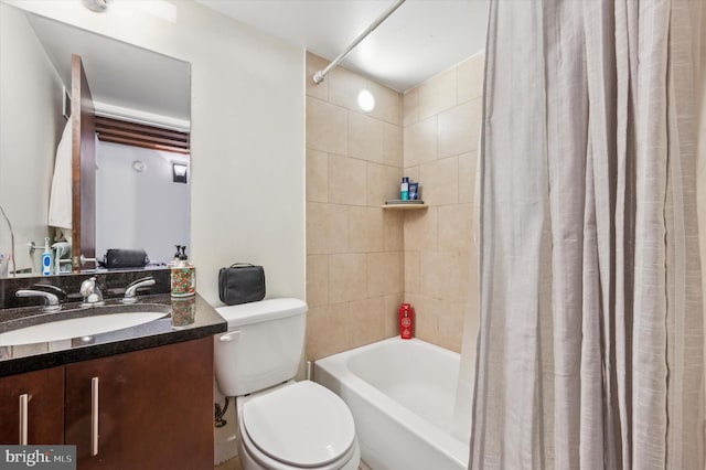 full bathroom featuring vanity, toilet, and shower / bathtub combination with curtain