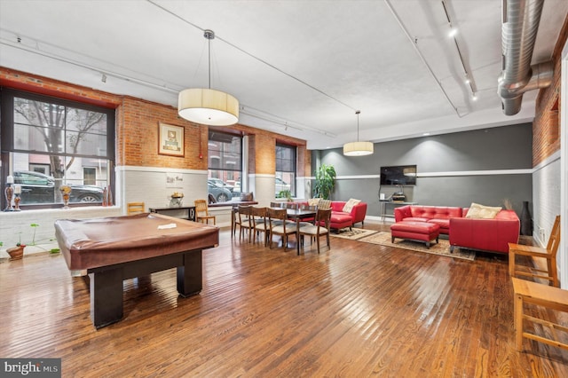 playroom featuring pool table, track lighting, and hardwood / wood-style flooring