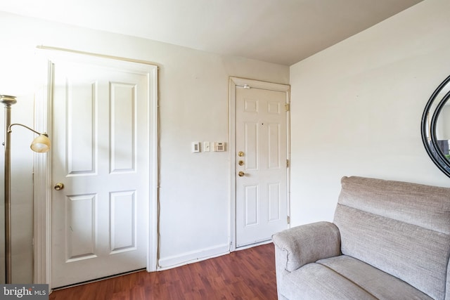 unfurnished room featuring dark hardwood / wood-style floors