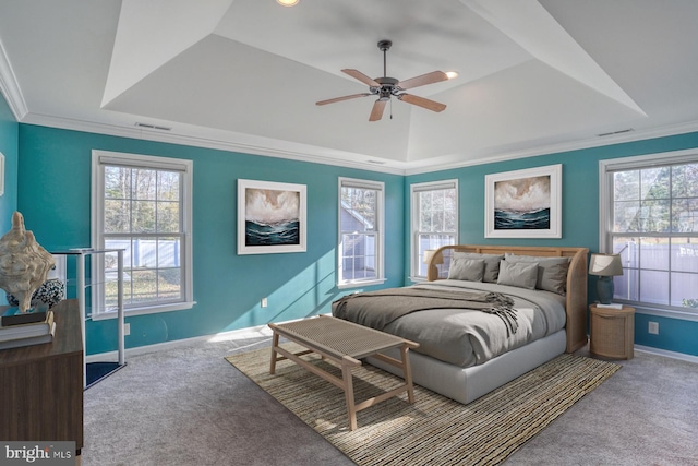 bedroom featuring carpet flooring, a raised ceiling, ceiling fan, and crown molding