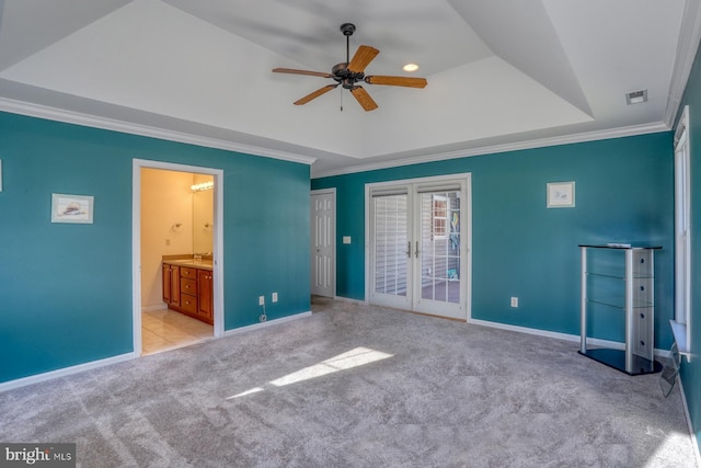 unfurnished bedroom with light carpet, connected bathroom, and ornamental molding