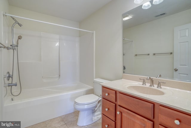 full bathroom with tile patterned floors, vanity, shower / bathtub combination, and toilet