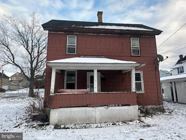 view of property with covered porch