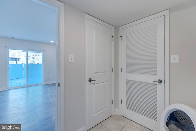 interior space featuring light tile patterned flooring